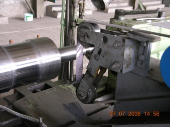 Belt-grinding devices and machine tools 0